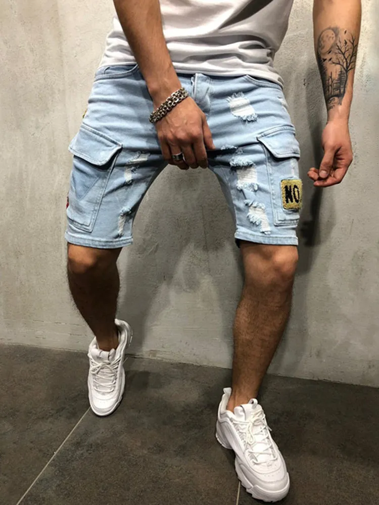 Stylish Flap Pocket Torn Denim Shorts