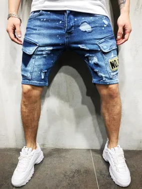 Stylish Flap Pocket Torn Denim Shorts